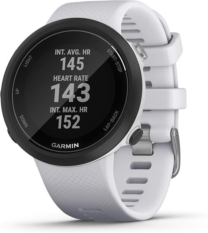 Close-up of a Garmin smartwatch displaying heart rate data on a white band.