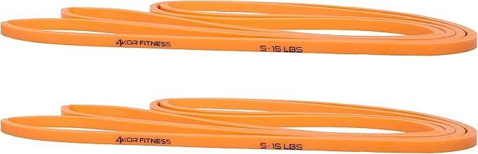 Two orange resistance bands labeled '5-15 lbs' on a white background.