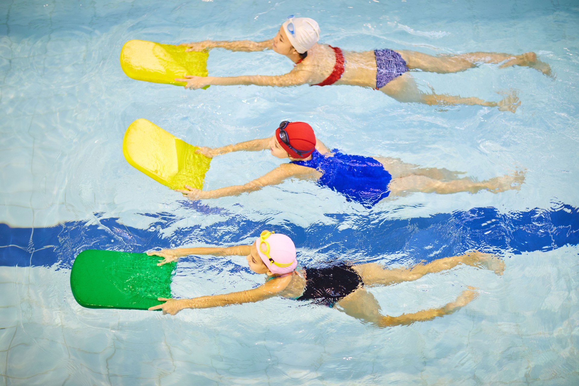 Children swimming in pool